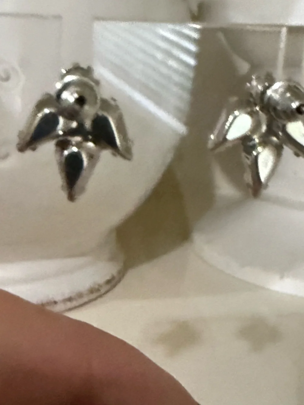 Silver Toned Pronged Studs With Emerald Accent